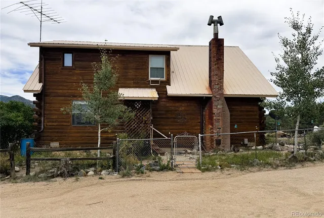 a front view of a house with parking space