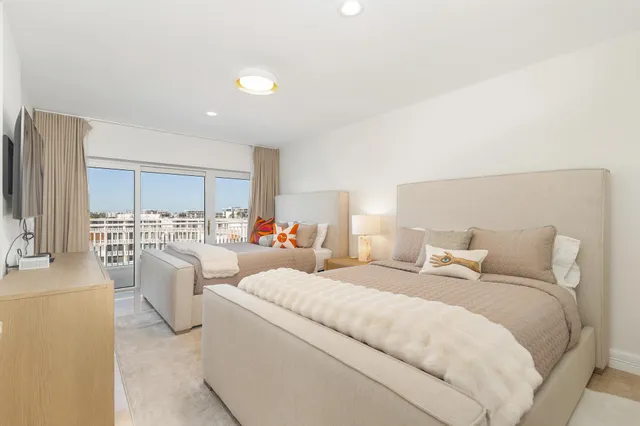 a room with bed and a couch