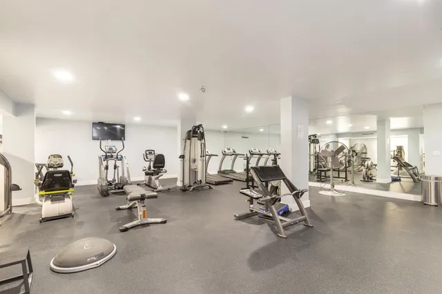 a view of a room with gym equipment