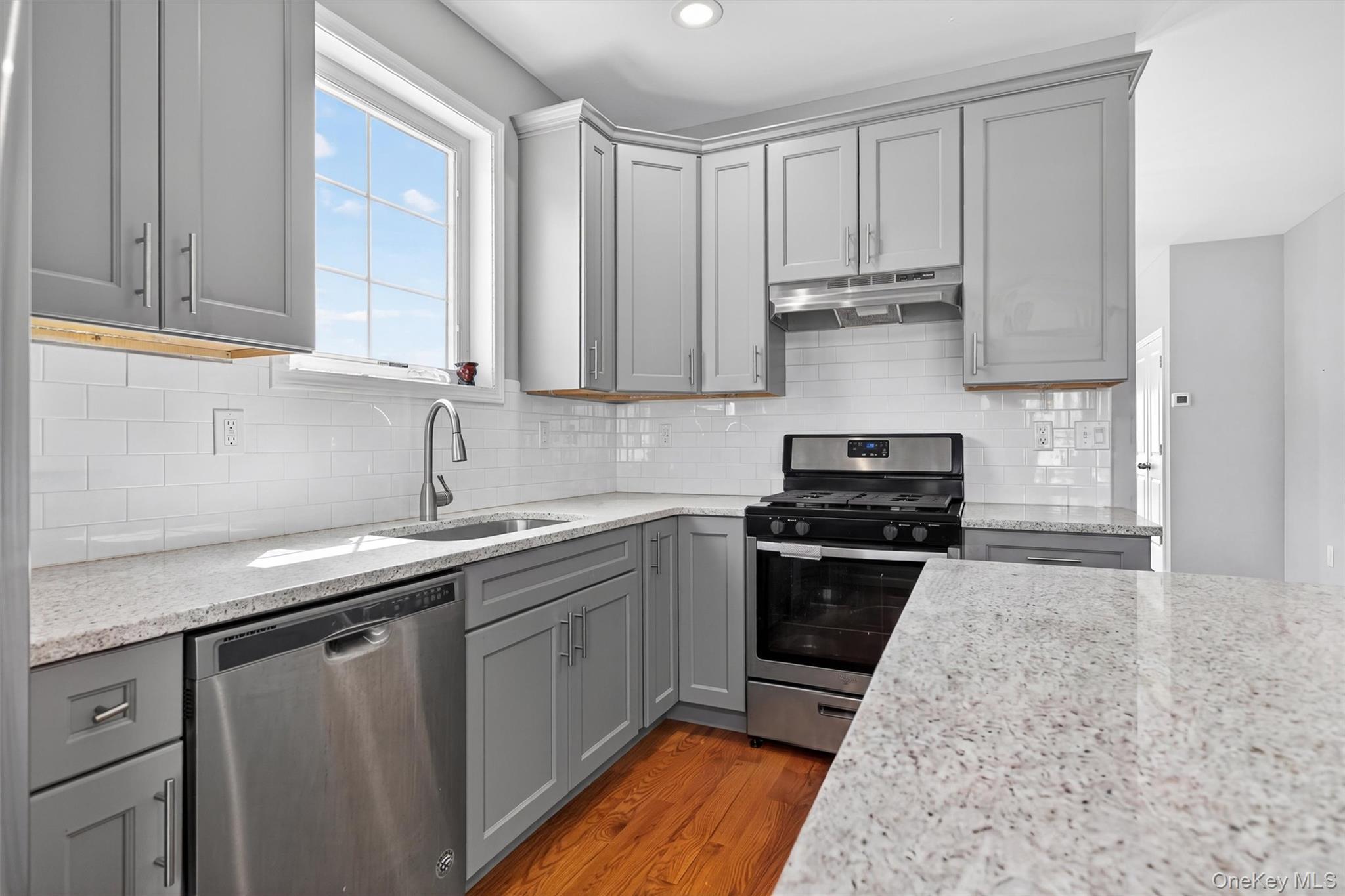 35 Pinto Road Middletown, NY 10941 - Photo 16 of 41 a kitchen with stainless steel appliances granite countertop a sink stove and cabinets