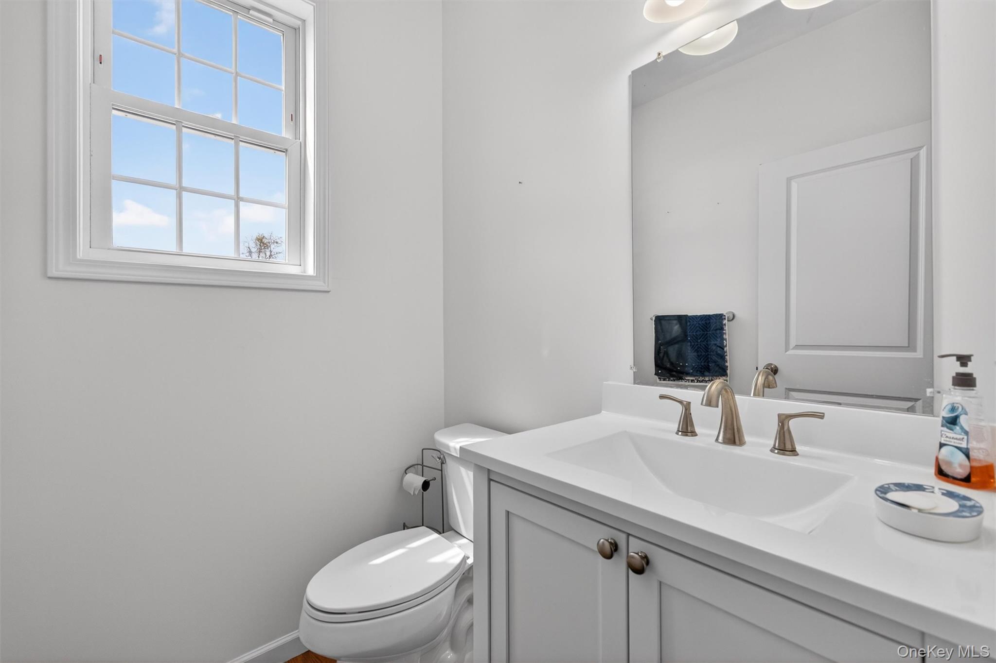 35 Pinto Road Middletown, NY 10941 - Photo 28 of 41 a bathroom with a sink a toilet and a window