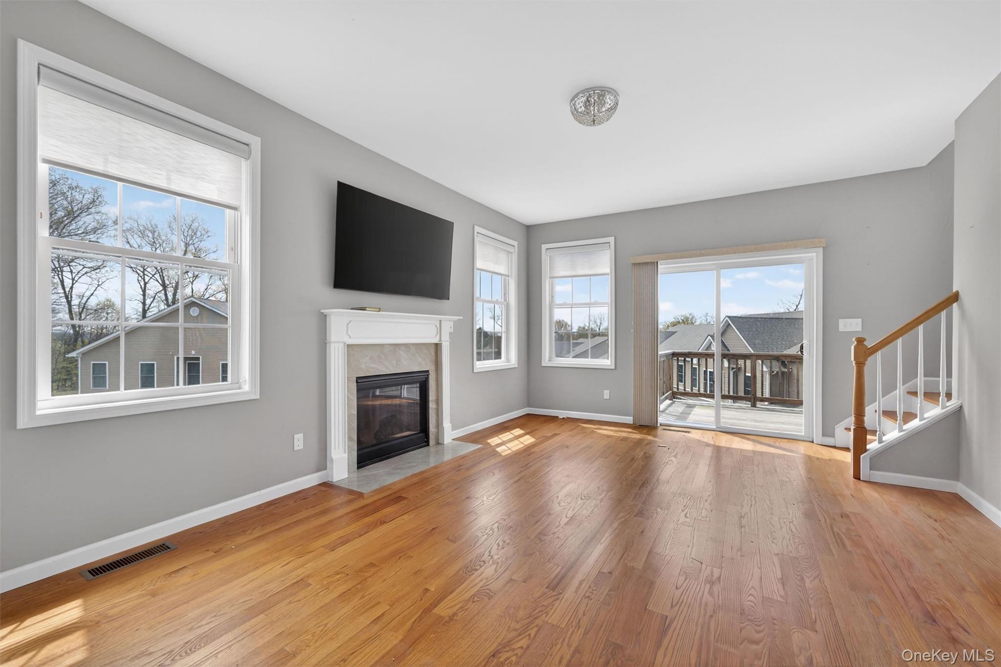 35 Pinto Road Middletown, NY 10941 - Photo 6 of 41 a view of an empty room with wooden floor and a window
