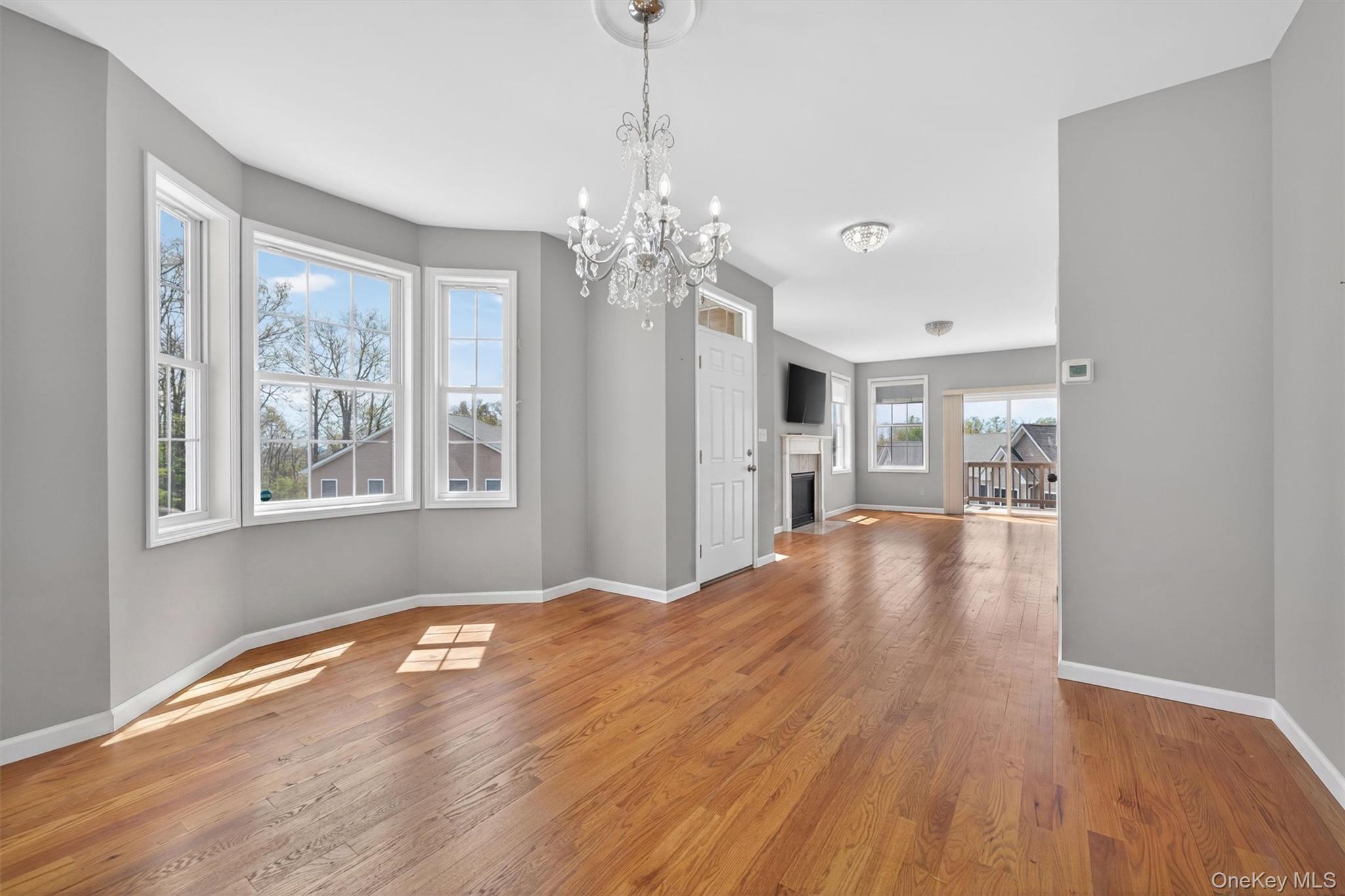 35 Pinto Road Middletown, NY 10941 - Photo 10 of 41 a view of livingroom with chandelier and wooden floor