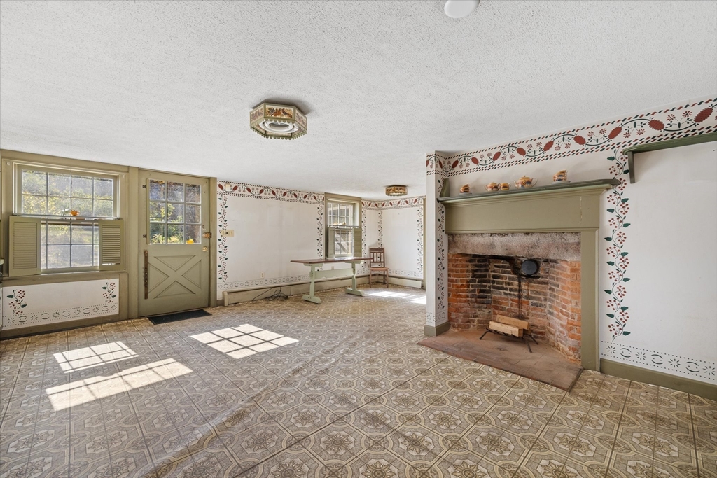 5 Carpenter Hill Road Charlton, MA 01507 - Photo 12 of 42 a view of a livingroom with a fireplace