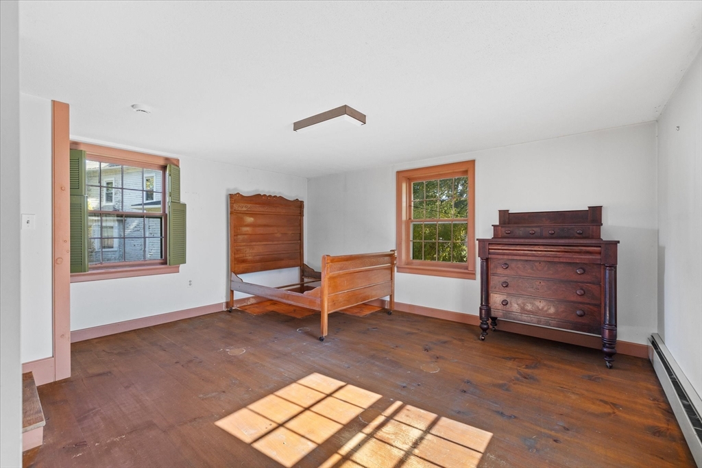 5 Carpenter Hill Road Charlton, MA 01507 - Photo 14 of 42 a living room with furniture and a window