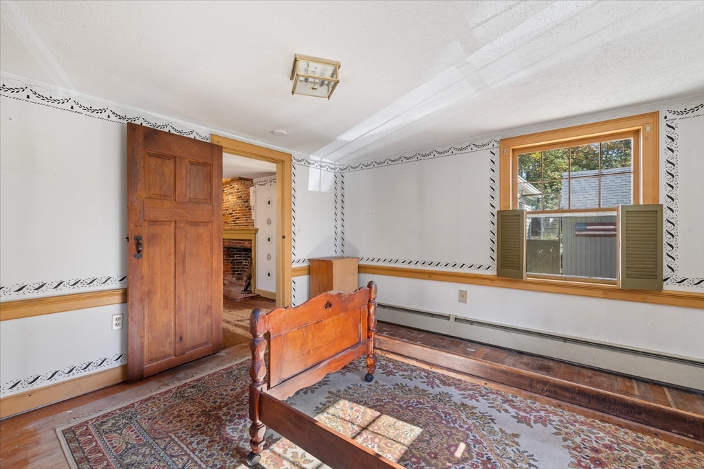 5 Carpenter Hill Road Charlton, MA 01507 - Photo 21 of 42 a living room with furniture and a window