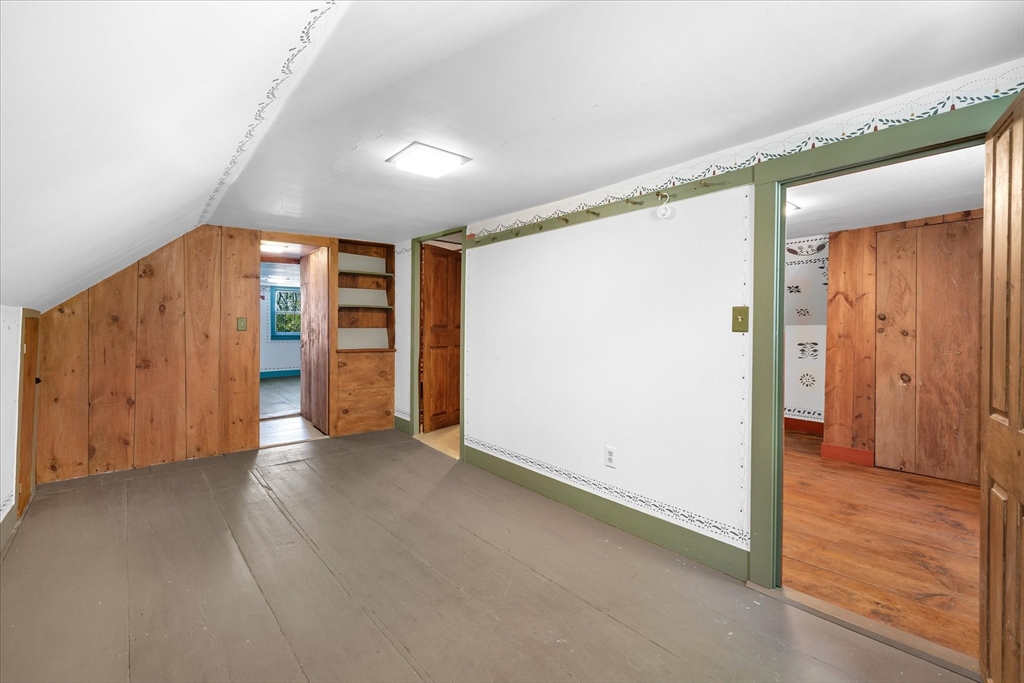 5 Carpenter Hill Road Charlton, MA 01507 - Photo 32 of 42 an empty room with closet and wooden door