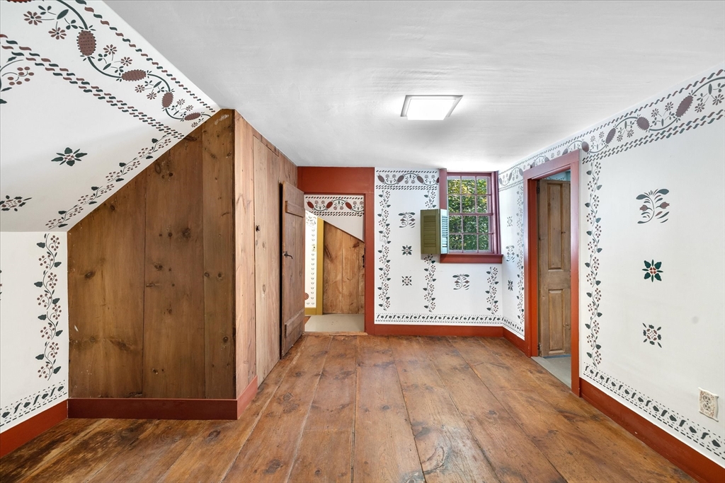 5 Carpenter Hill Road Charlton, MA 01507 - Photo 34 of 42 a view of a hallway with wooden floor and entryway