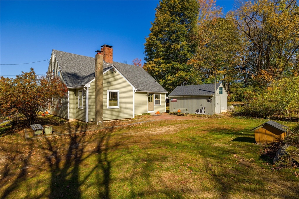 5 Carpenter Hill Road Charlton, MA 01507 - Photo 36 of 42 a front view of a house with a yard