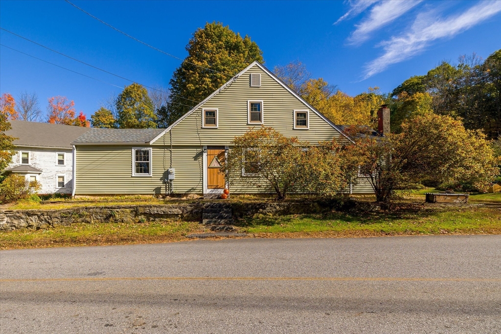 5 Carpenter Hill Road Charlton, MA 01507 - Photo 38 of 42 a view of a house with a yard