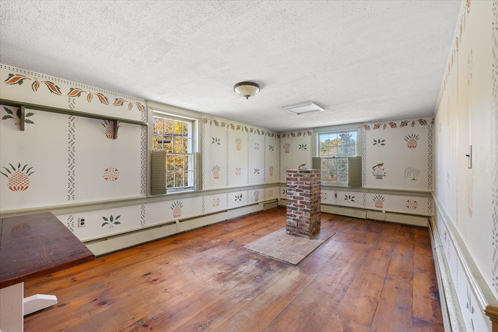 5 Carpenter Hill Road Charlton, MA 01507 - Photo 8 of 42 a spacious bedroom with a bed and a large window