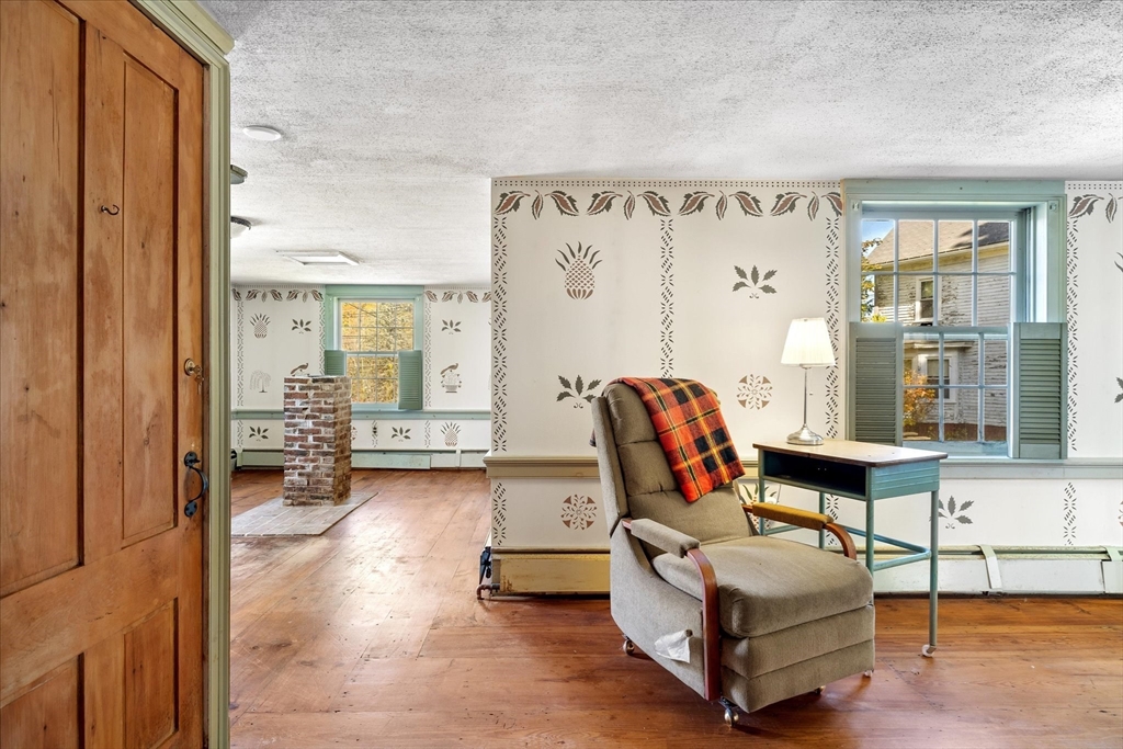 5 Carpenter Hill Road Charlton, MA 01507 - Photo 9 of 42 a living room with furniture and large windows