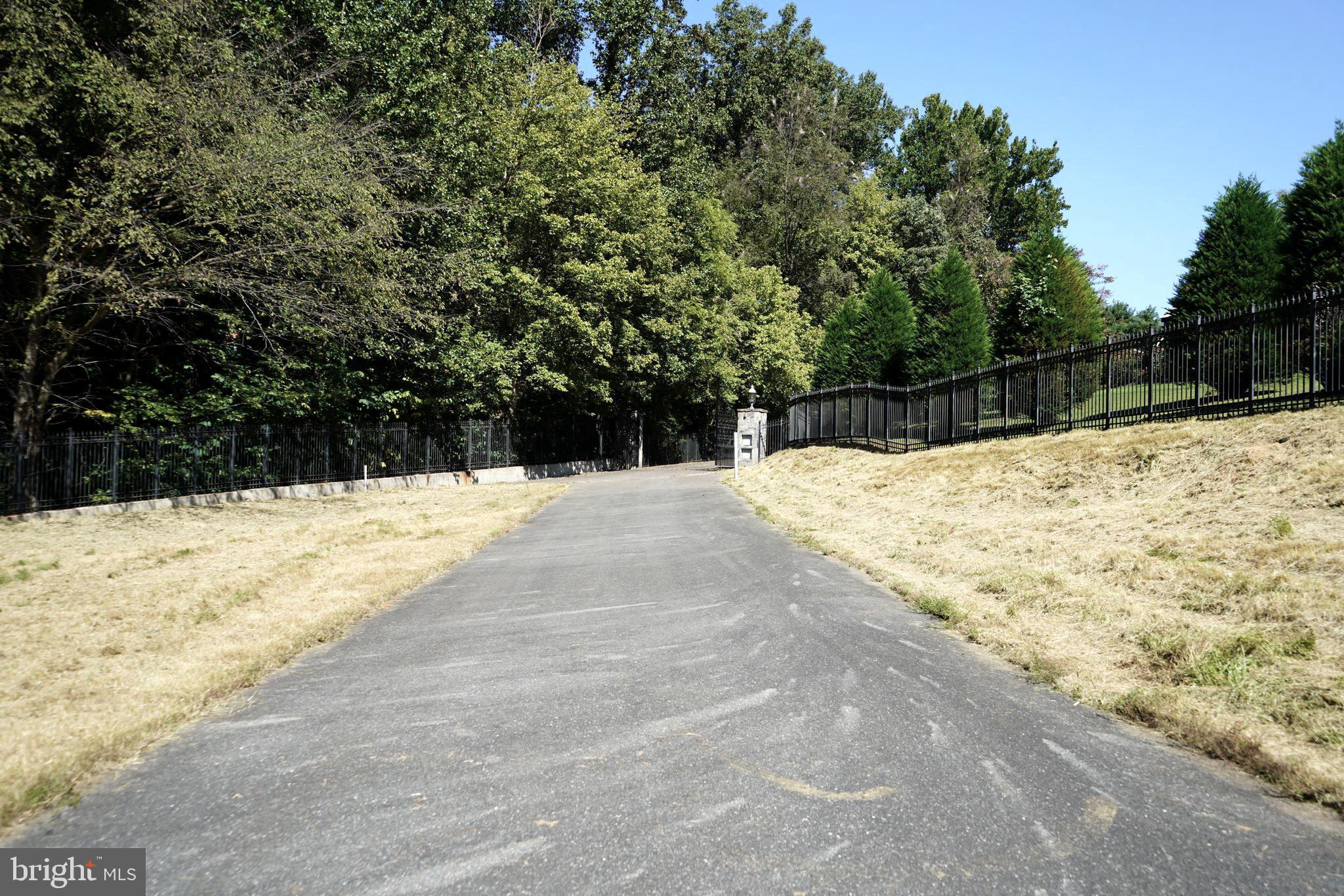 12000 River Road Potomac, MD 20854 - Photo 13 of 13 a swimming pool with a yard