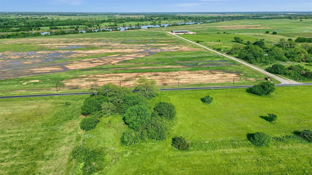 0 Carpenters Bluff Road Bells, TX 75414 - Photo 9 of 17 a view of a golf course with a lake view