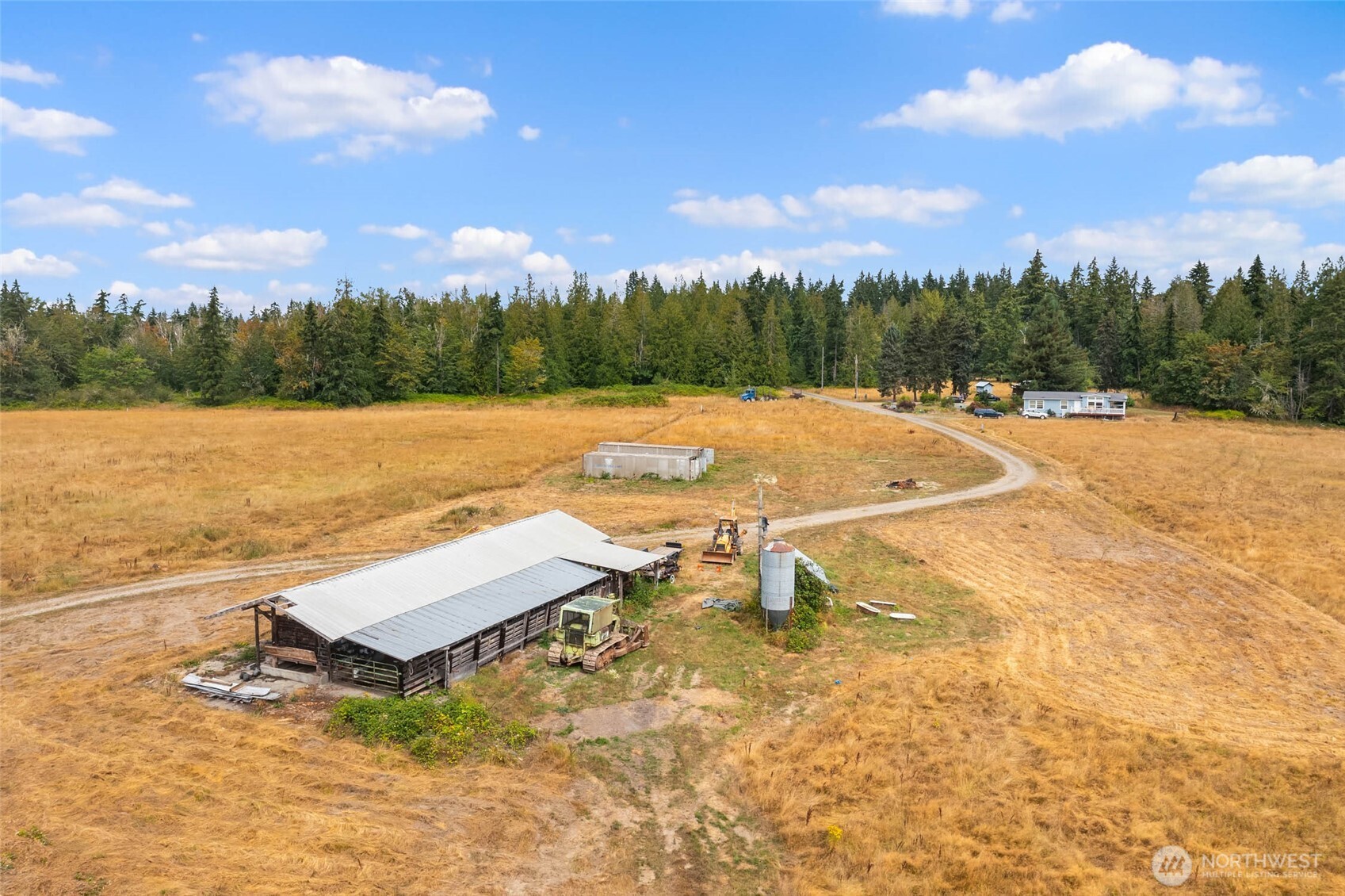 1716 304th Street East Roy, WA 98580 - Photo 17 of 21 a view of a lake with outside space