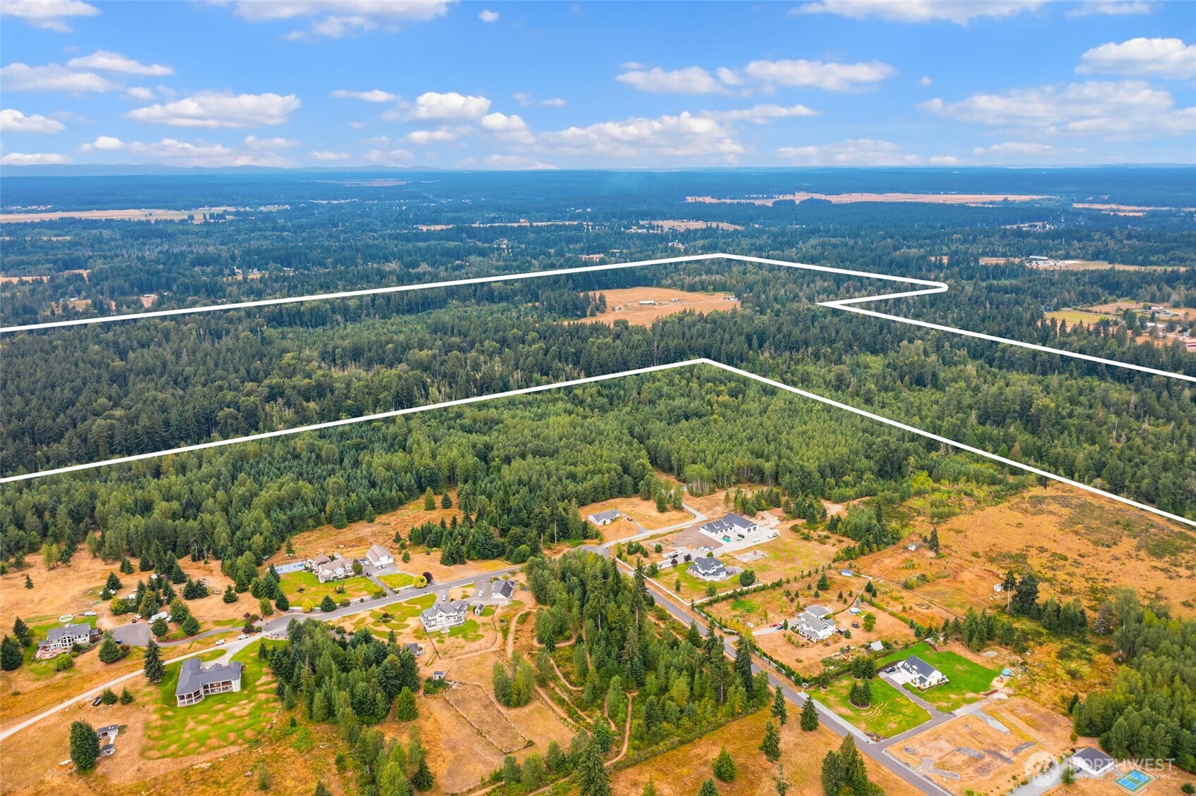 1716 304th Street East Roy, WA 98580 - Photo 6 of 21 a view of a lake from a balcony