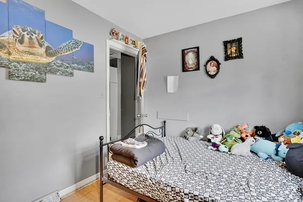a bedroom with a bed and a table