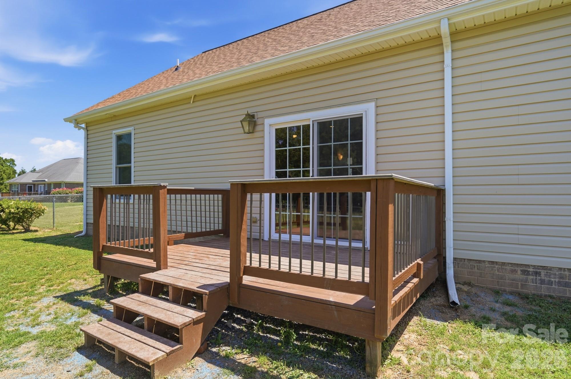 4415 Old Monroe Marshville Road Wingate, NC 28174 - Photo 23 of 28 a view of a small deck with a backyard