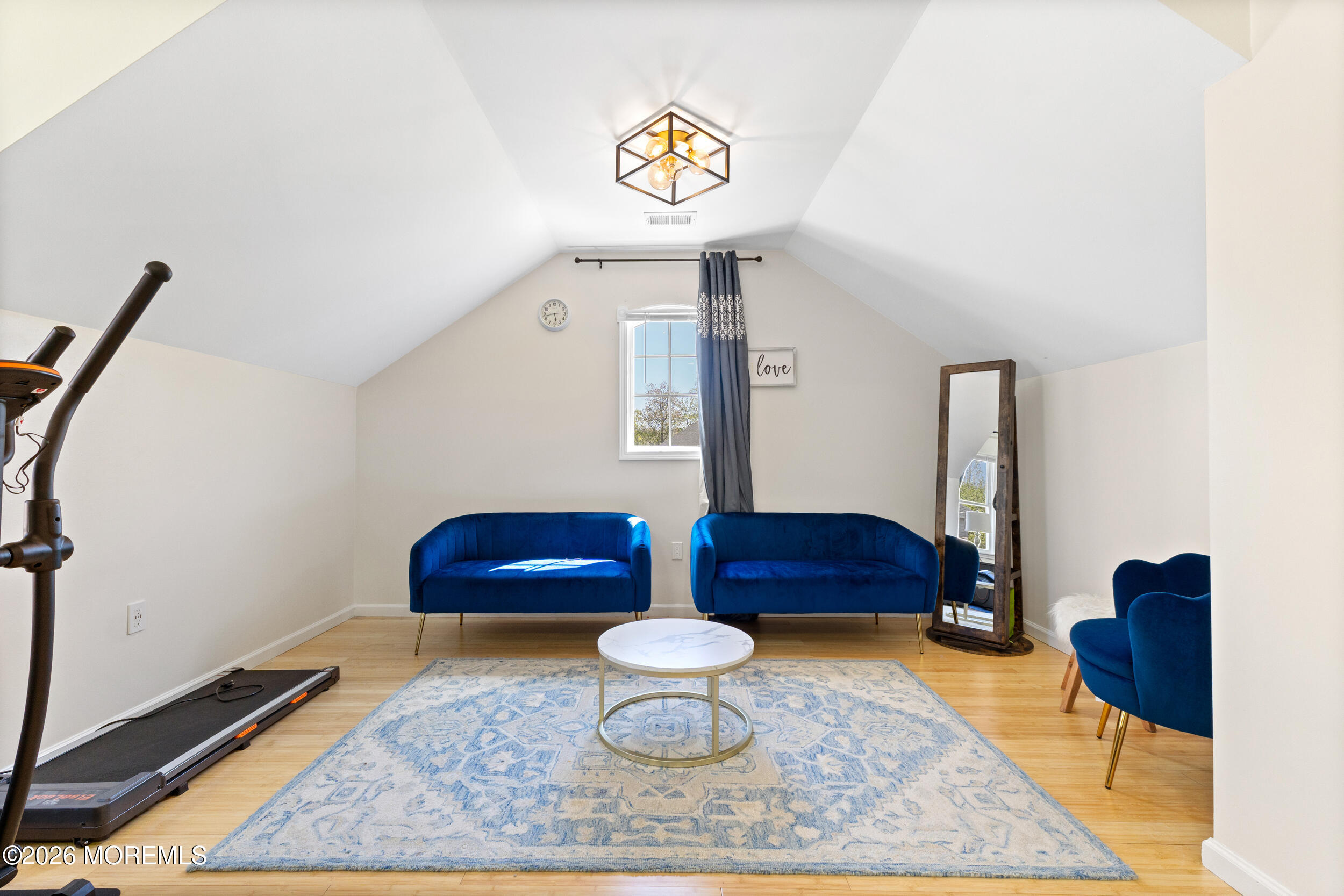 104 Autumn Road Matawan, NJ 07747 - Photo 30 of 64 a living room with furniture and a rug