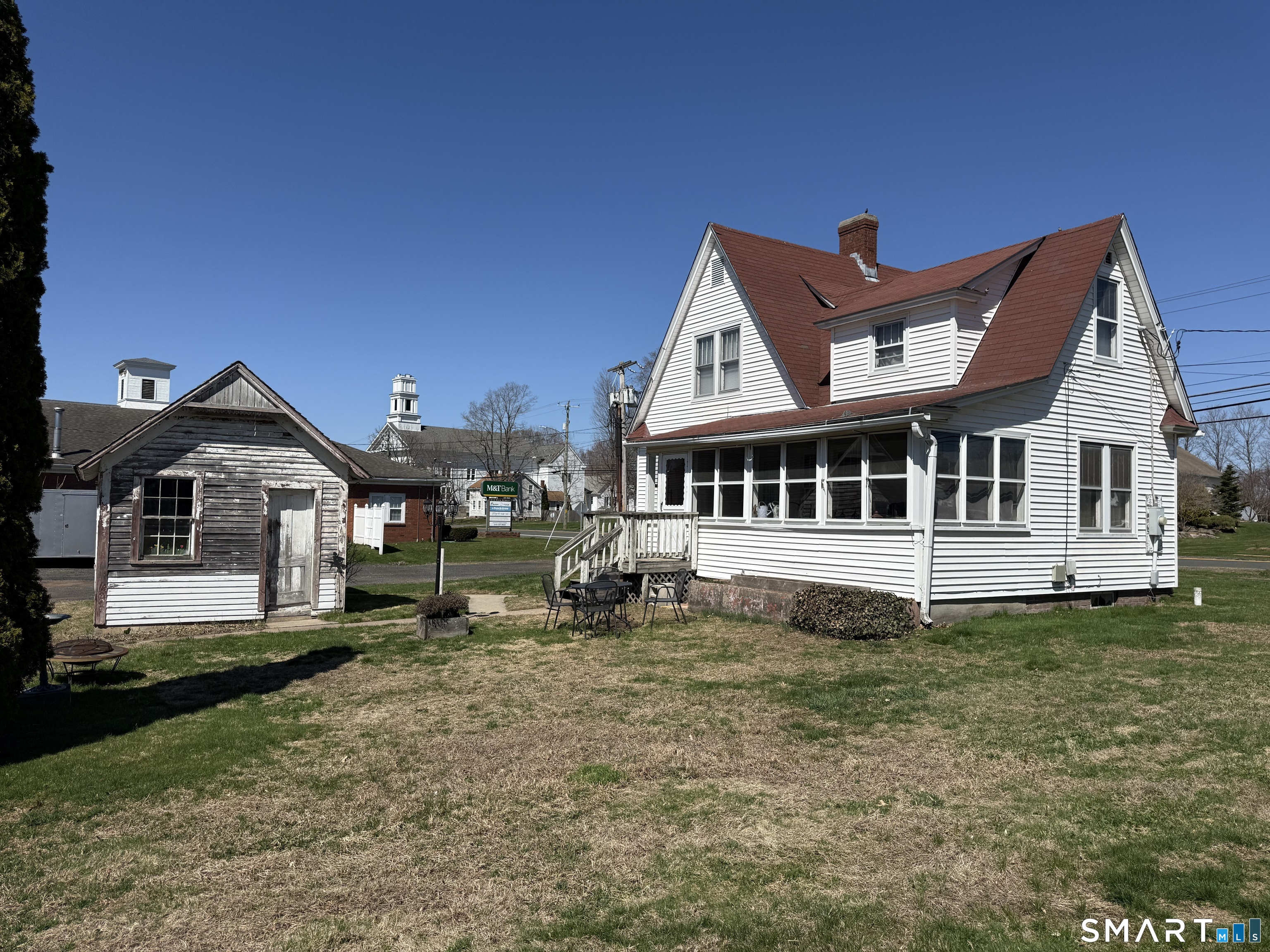 616 Main Street Somers, CT 06071 - Photo 4 of 24 a front view of a house with a yard