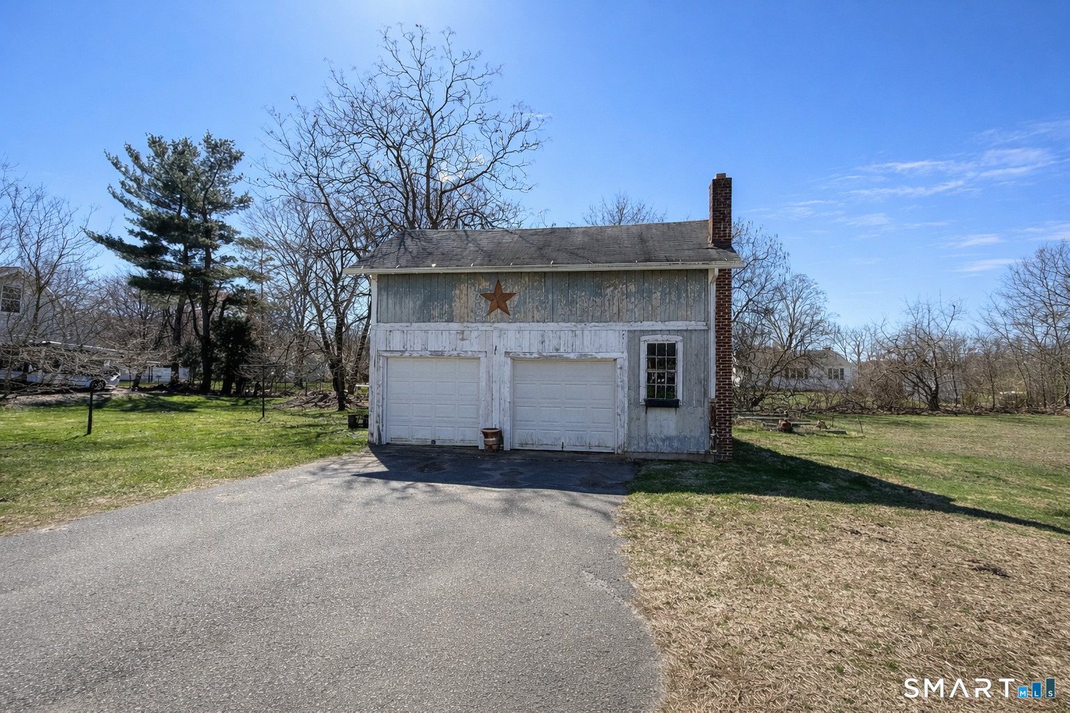 616 Main Street Somers, CT 06071 - Photo 7 of 24 a view of a house with a yard