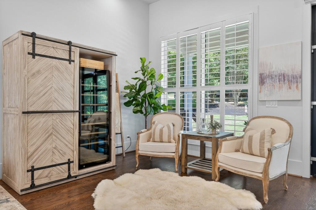 4275 Habersham Way Cumming, GA 30041 - Photo 13 of 34 a living room with furniture and a large window