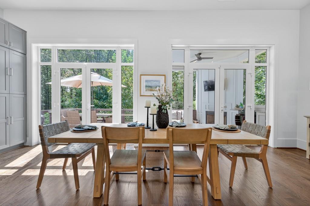4275 Habersham Way Cumming, GA 30041 - Photo 14 of 34 a view of a dining room with furniture and wooden floor