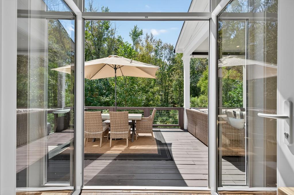 4275 Habersham Way Cumming, GA 30041 - Photo 26 of 34 a balcony with furniture and outdoor view