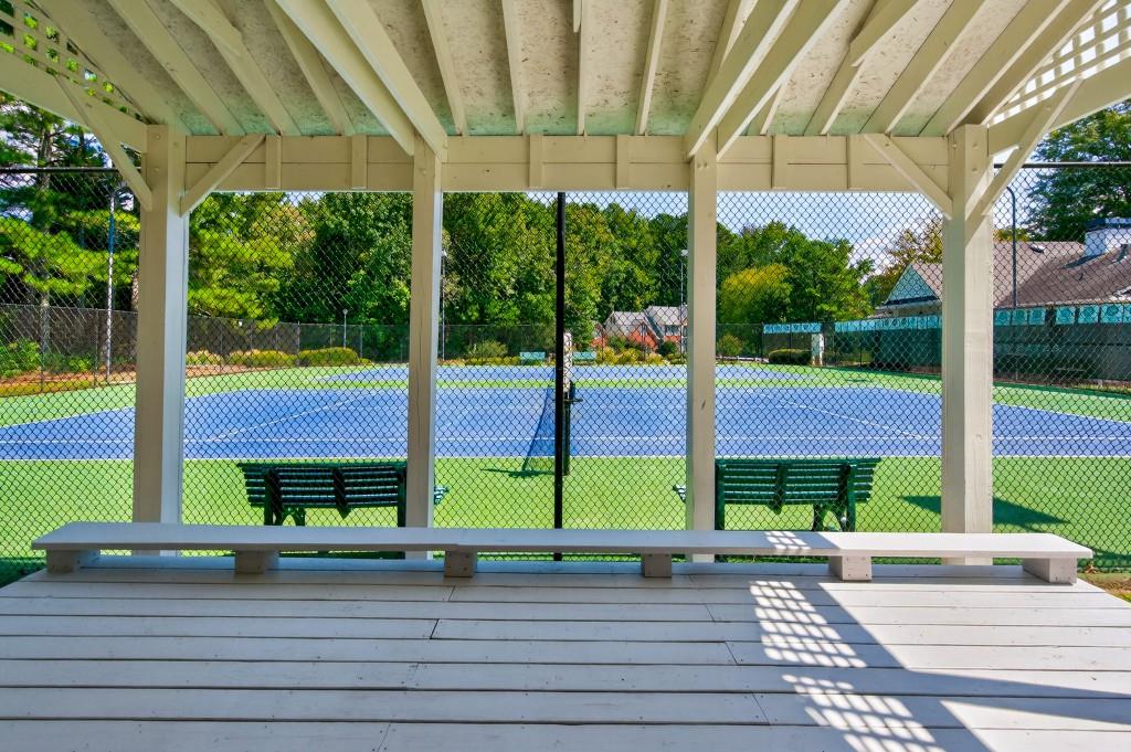 4275 Habersham Way Cumming, GA 30041 - Photo 34 of 34 a view of a street with a large window and a garden