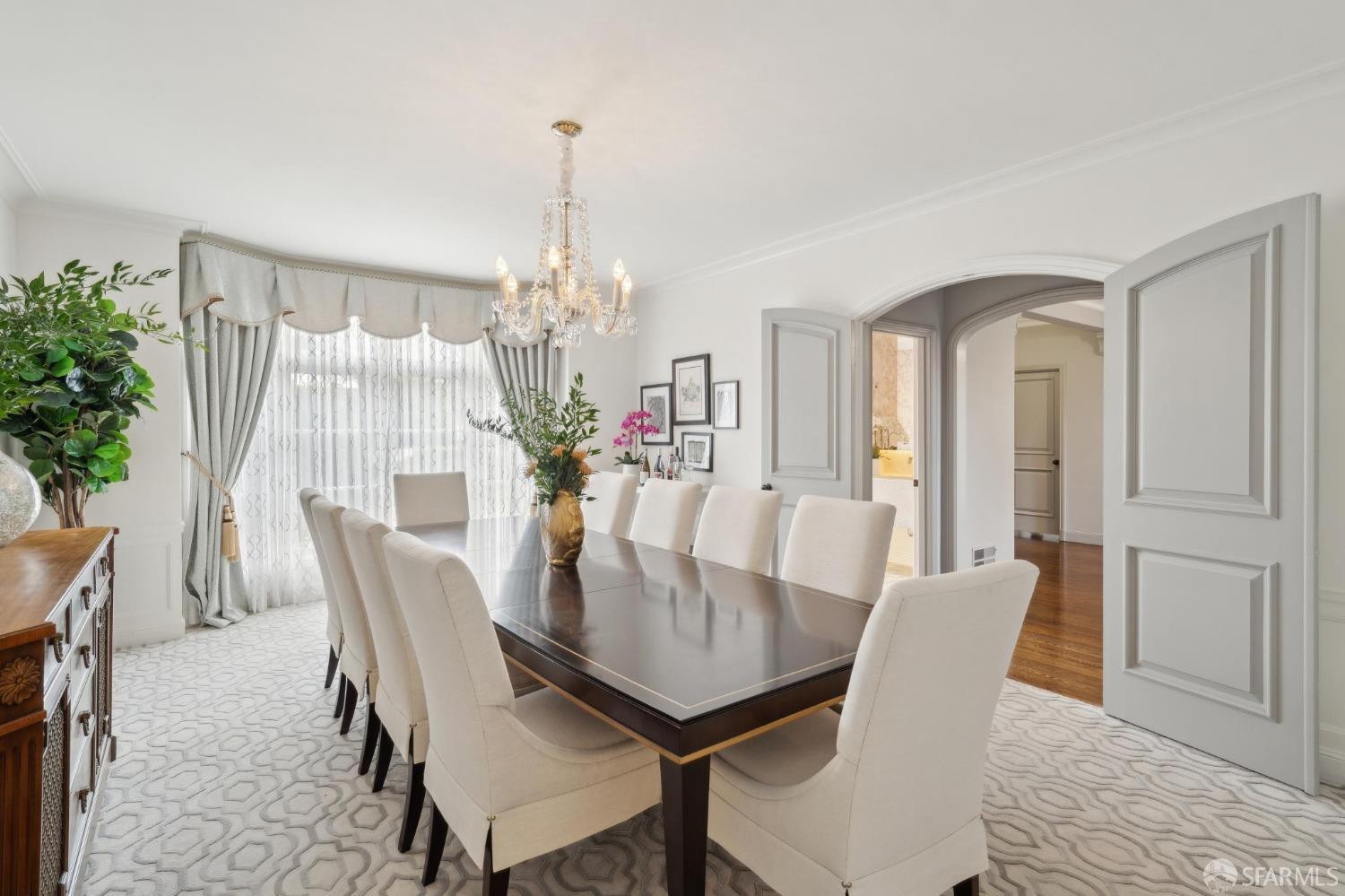 100 Stonecrest Drive San Francisco, CA 94132 - Photo 15 of 64 a view of a dining room with furniture and chandelier