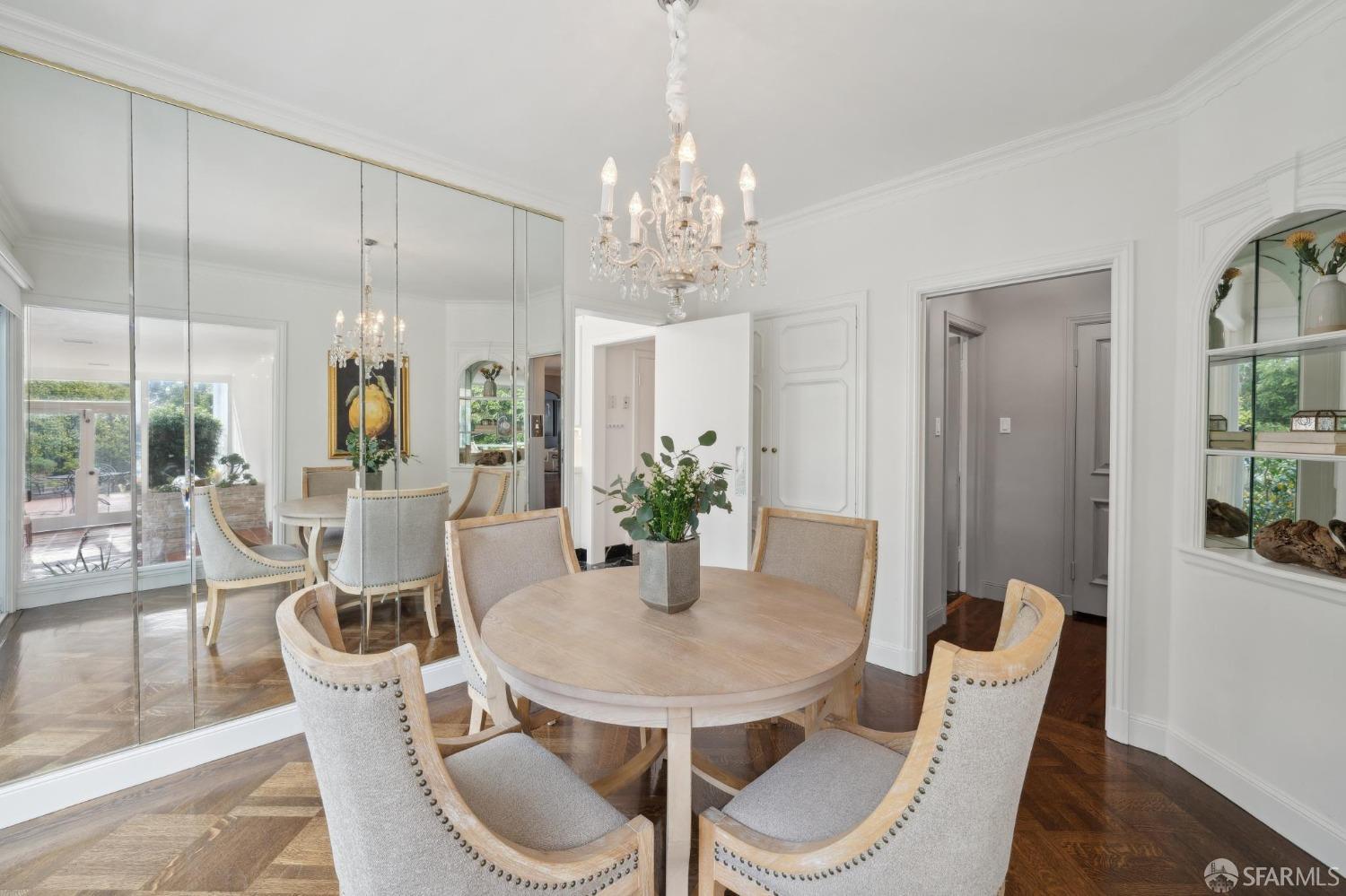 100 Stonecrest Drive San Francisco, CA 94132 - Photo 17 of 64 a dining room with furniture a chandelier and wooden floor