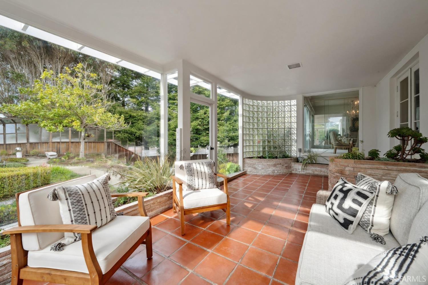 100 Stonecrest Drive San Francisco, CA 94132 - Photo 21 of 64 a living room with furniture and a large window