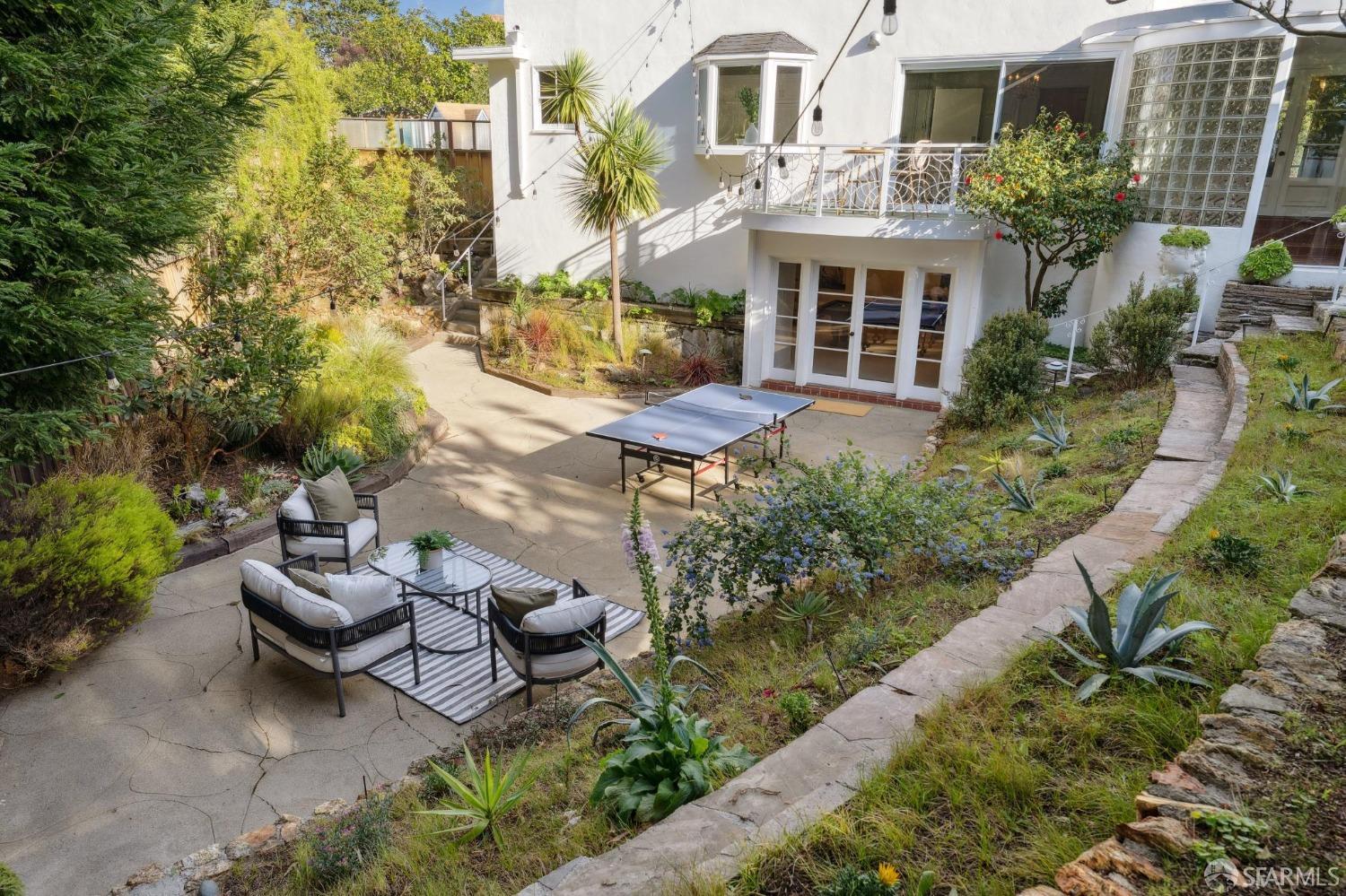 100 Stonecrest Drive San Francisco, CA 94132 - Photo 56 of 64 a view of a patio with table and chairs and potted plants