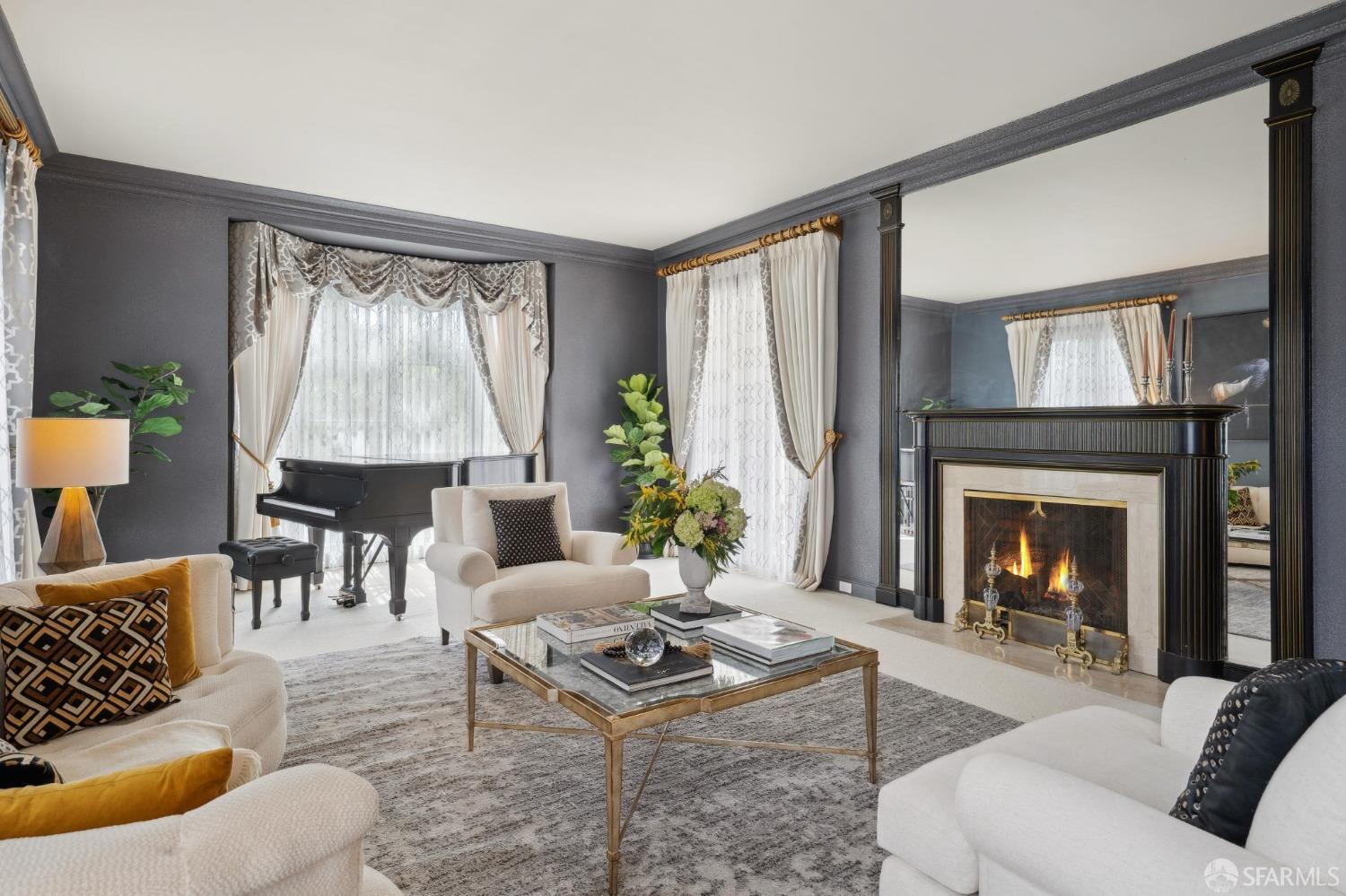 100 Stonecrest Drive San Francisco, CA 94132 - Photo 10 of 64 a living room with furniture and a fireplace