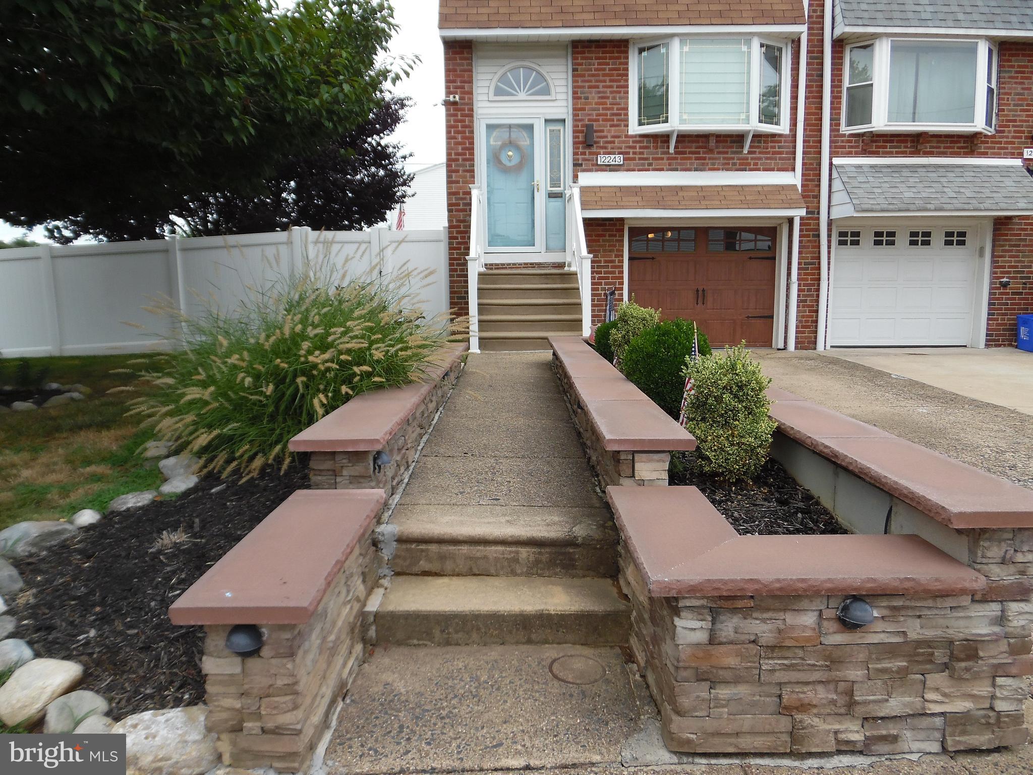 12243 Rambler Road Philadelphia, PA 19154 - Photo 2 of 26 Retaining wall with lighting
