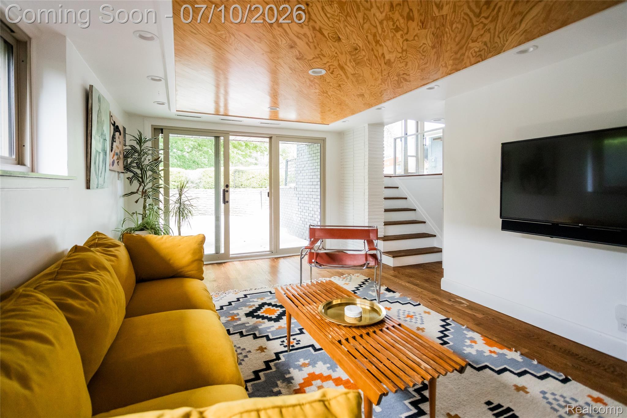 600 Middlesex Road Grosse Pointe, MI 48230 - Photo 28 of 43 Living area featuring wood-finish flooring, a wood-panel ceiling, and recessed lighting