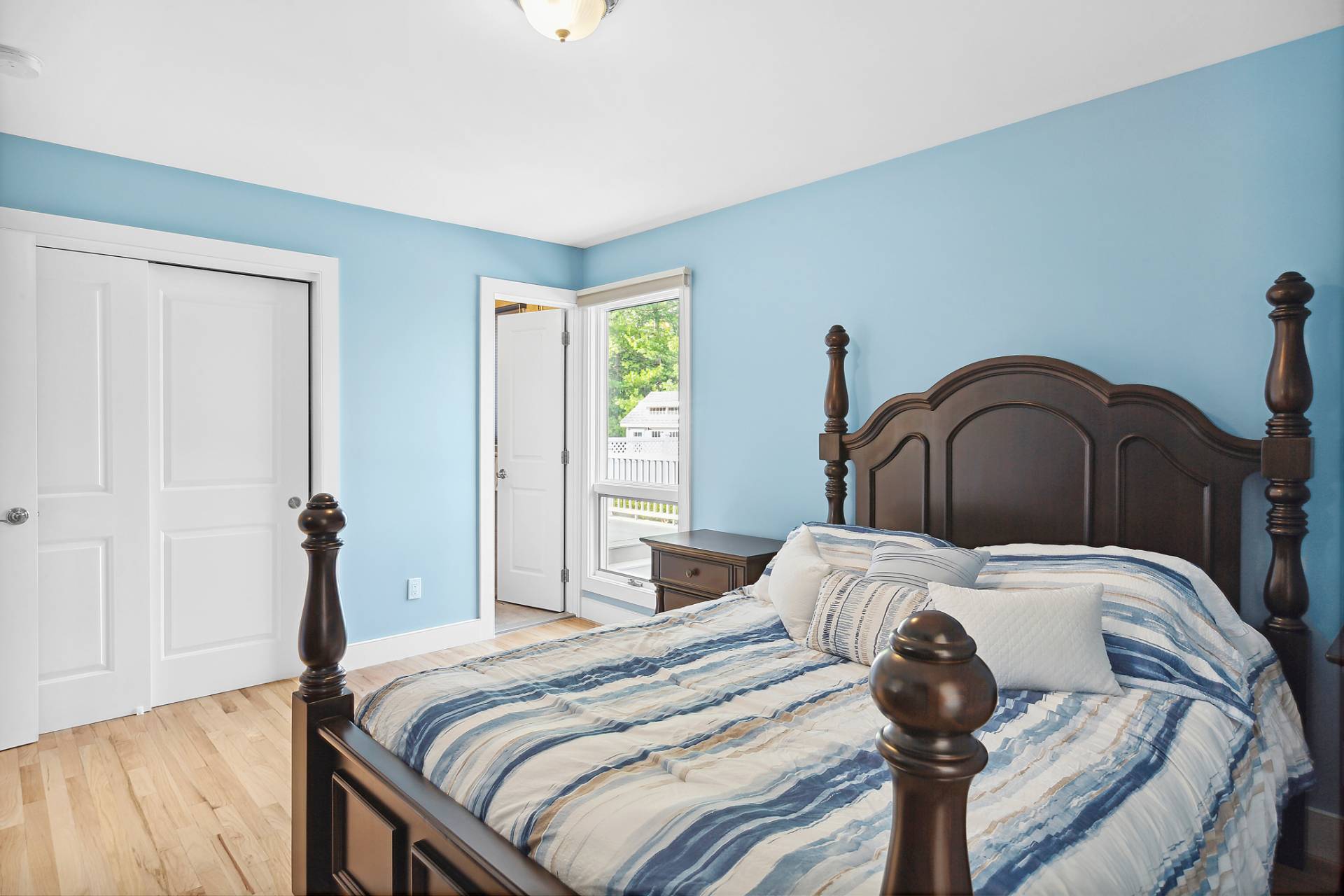 60 Cedar Drive East Hampton, NY 11937 - Photo 5 of 10 a bedroom with a bed and dresser