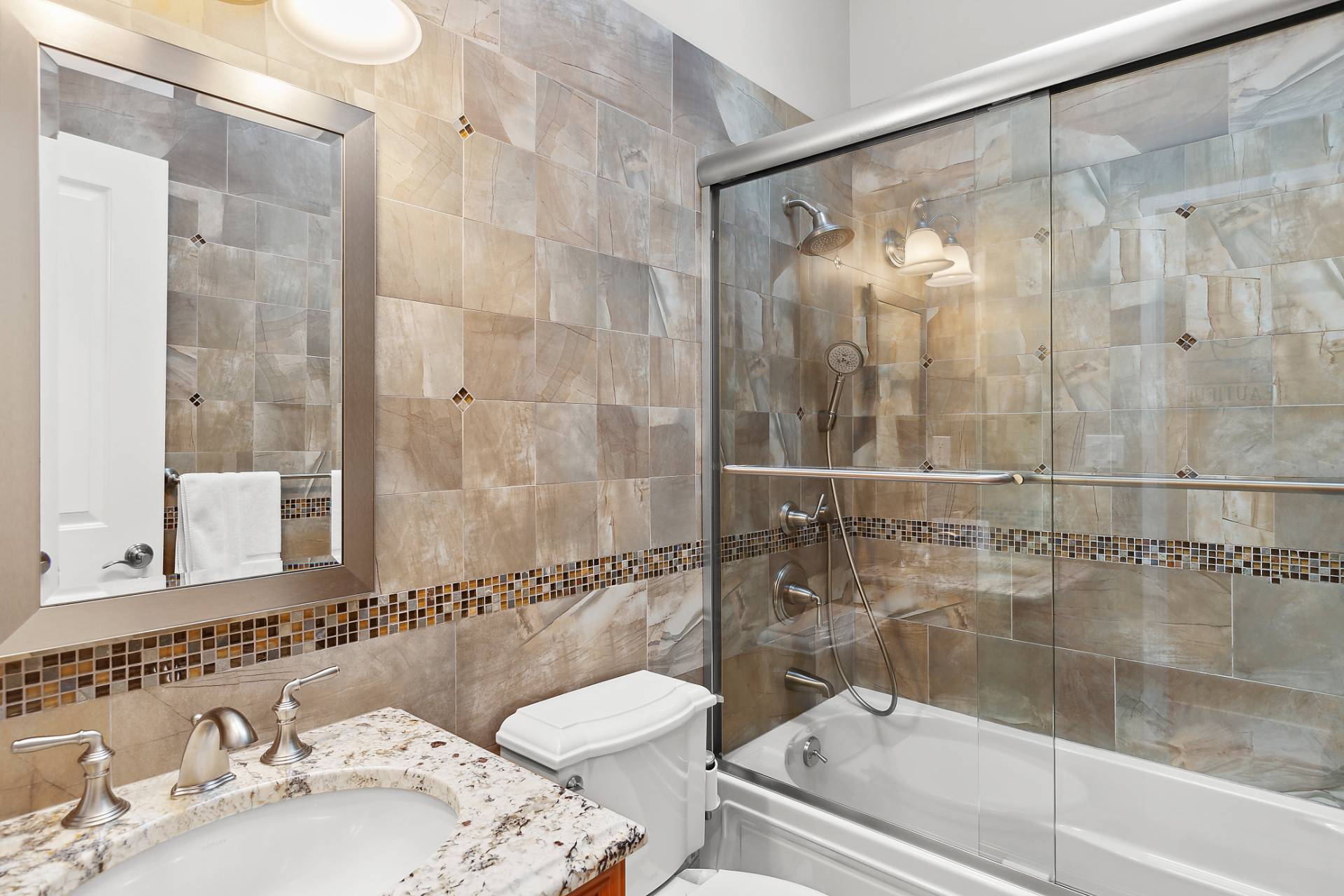 60 Cedar Drive East Hampton, NY 11937 - Photo 9 of 10 a bathroom with a sink and a mirror