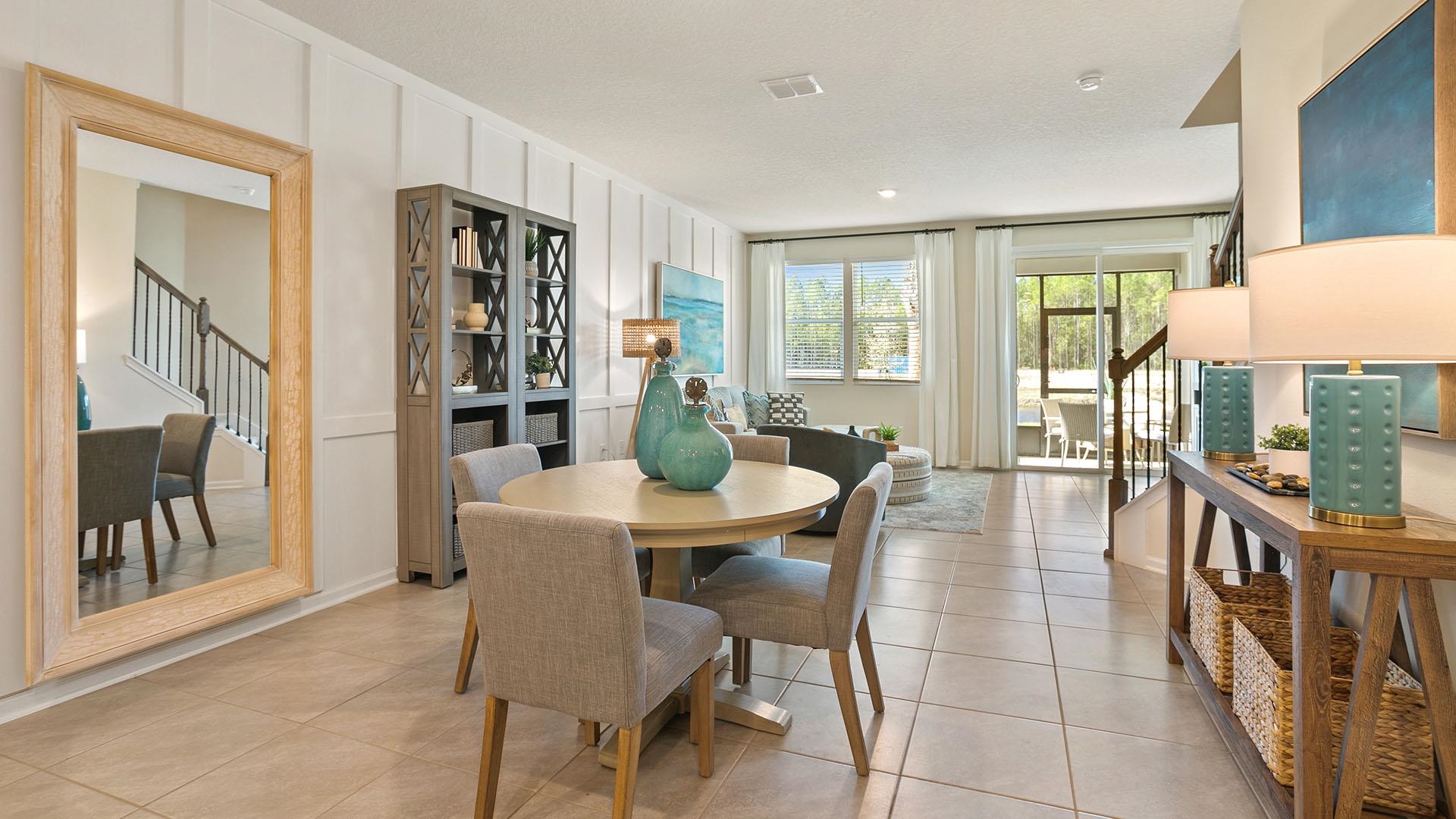 340 Redbud Road Palm Coast, FL 32137 - Photo 8 of 33 a view of a dining room with furniture window and wooden floor
