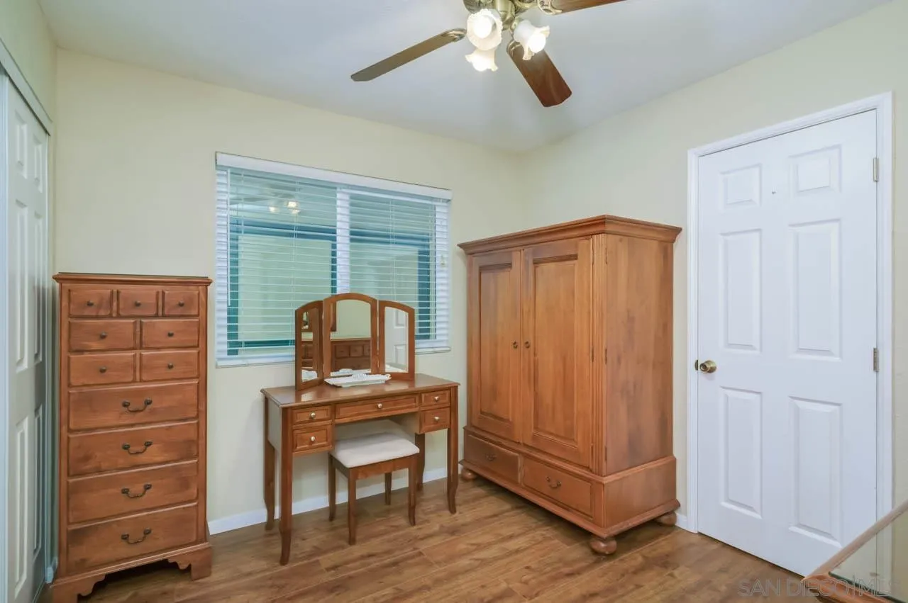 13499 Khuram Street Lakeside, CA 92040 - Photo 18 of 50 a view of workspace with furniture and wooden floor