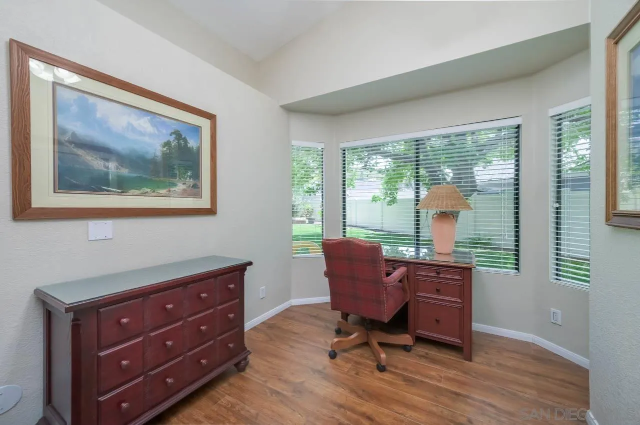 13499 Khuram Street Lakeside, CA 92040 - Photo 19 of 50 a view of a workspace with furniture and a window