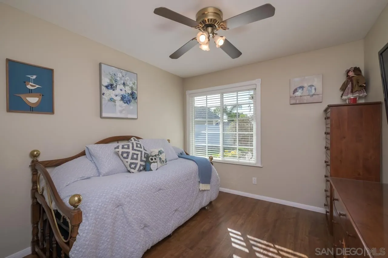 13499 Khuram Street Lakeside, CA 92040 - Photo 22 of 50 a bedroom with a bed and a window