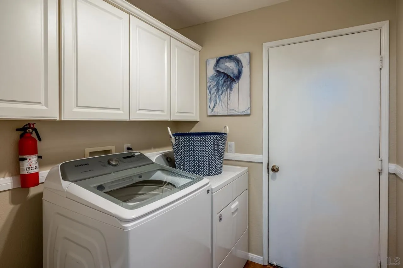 13499 Khuram Street Lakeside, CA 92040 - Photo 24 of 50 a utility room with dryer and washer