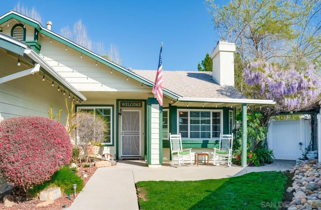 13499 Khuram Street Lakeside, CA 92040 - Photo 3 of 50 a view of a house with backyard and porch