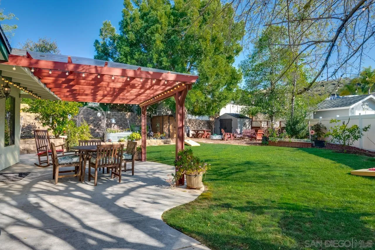 13499 Khuram Street Lakeside, CA 92040 - Photo 35 of 50 a patio with table and chairs
