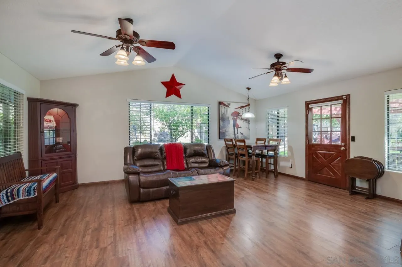 13499 Khuram Street Lakeside, CA 92040 - Photo 4 of 50 a living room with furniture and wooden floor