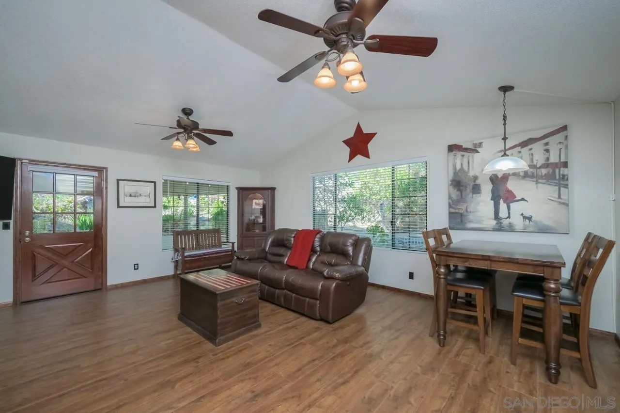 13499 Khuram Street Lakeside, CA 92040 - Photo 5 of 50 a living room with furniture and a large window