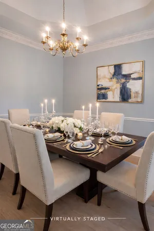 a view of an empty room with window and fireplace