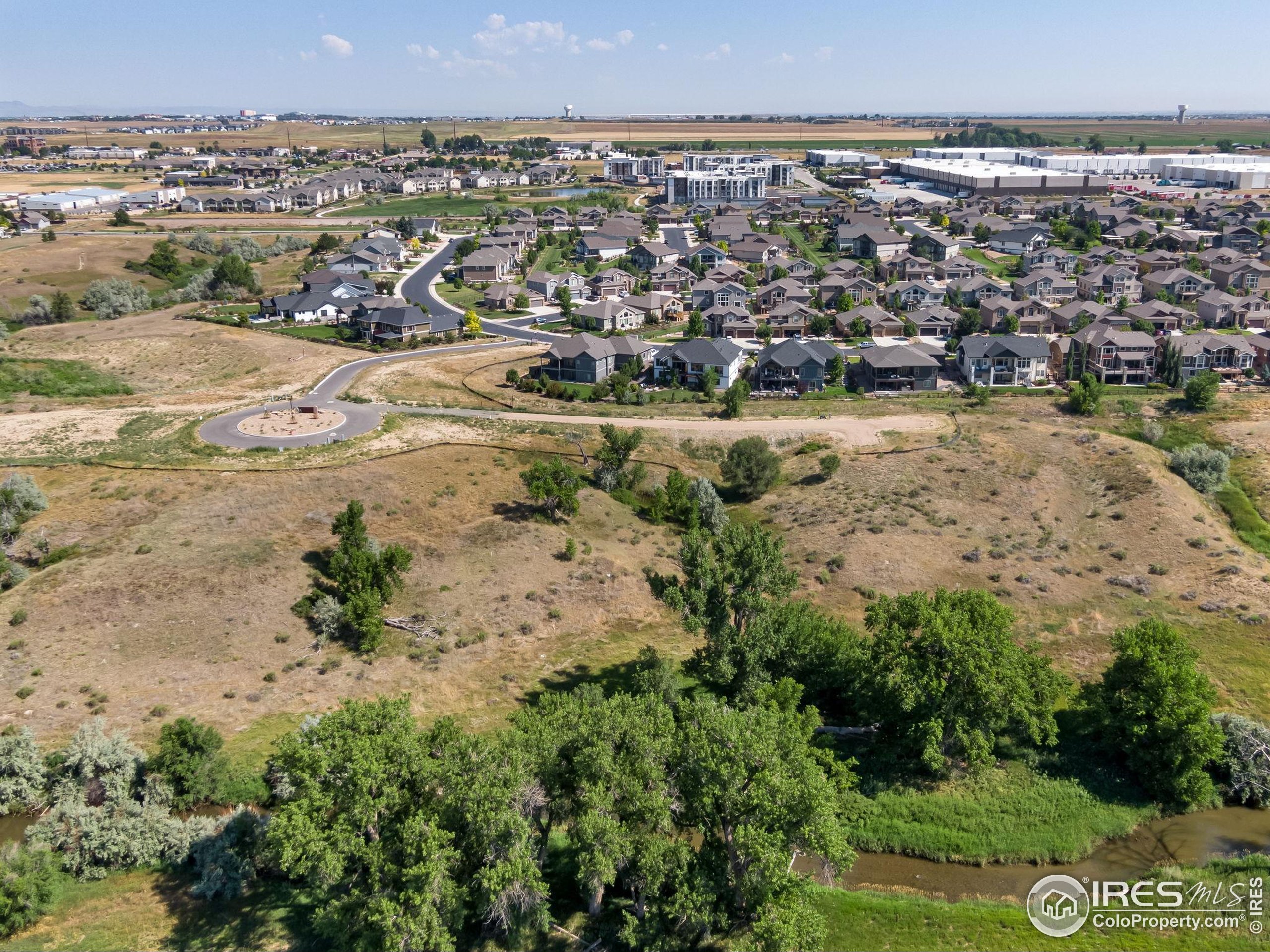 4229 Luchello Court Johnstown, CO 80534 - Photo 17 of 20 an aerial view of multiple house