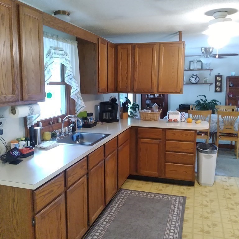 43 Apple Road Brimfield, MA 01010 - Photo 6 of 20 a kitchen with a sink cabinets and window